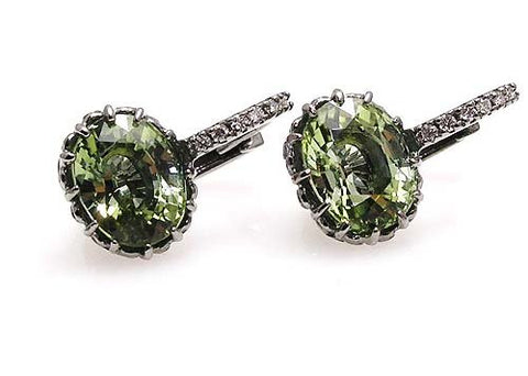 Green tourmaline earrings .